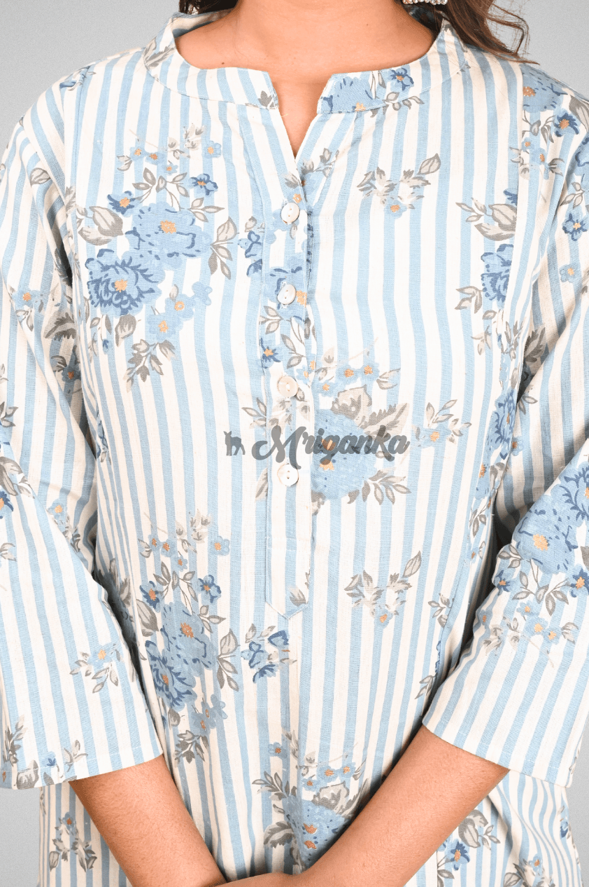 White Cotton A-Line Kurta Pant Set with Functional Buttons, Placket and Side Pockets by Mriganka